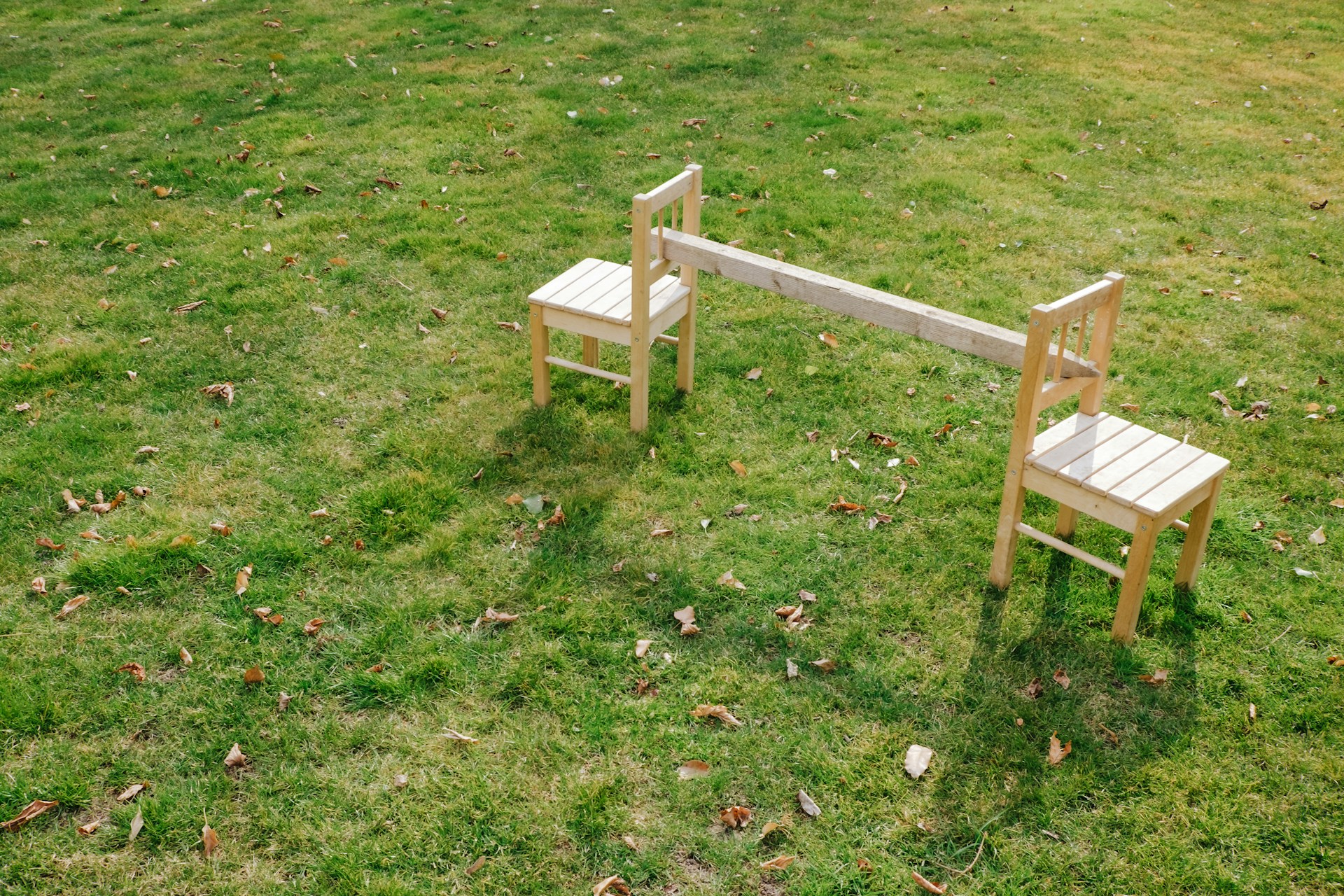 Connected wooden chairs